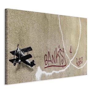 Tableau - Banksy's Plane (1-part) - Red Graffiti Text on Mural Background